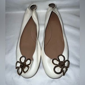 Chloe flats with flower chain embellishment